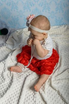 Portrait of adorable baby girl. Childhood.
