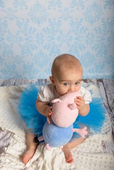 Portrait of adorable baby girl. Childhood.