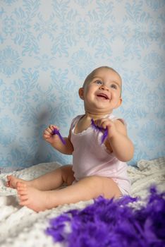 Portrait of adorable baby girl. Childhood.