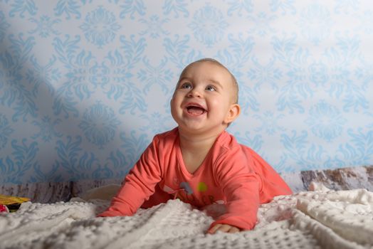 Portrait of adorable baby girl. Childhood.