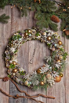 Christmas garland on an old wooden background