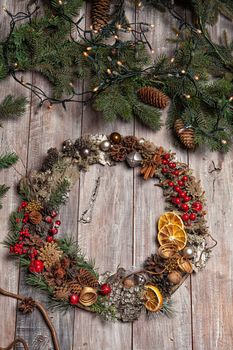 Christmas garland on an old wooden background