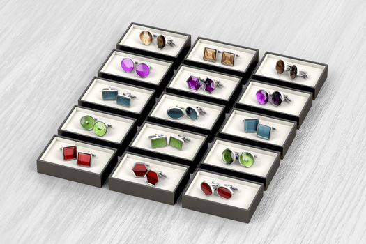 Rows of different designs of cufflinks