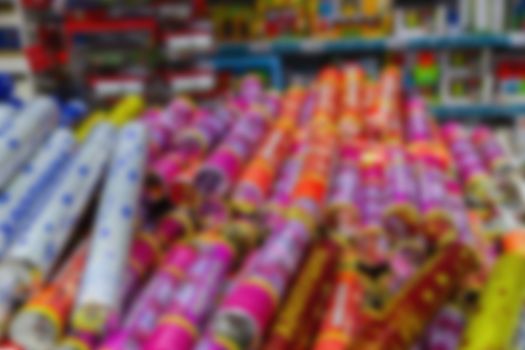 Christmas decoration on abstract background. Blurred background. Christmas crackers in the store.