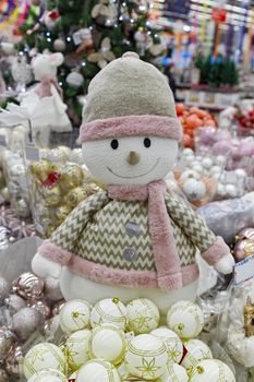 Christmas toy merry snowman. Traditional festive interior decoration for the New year.