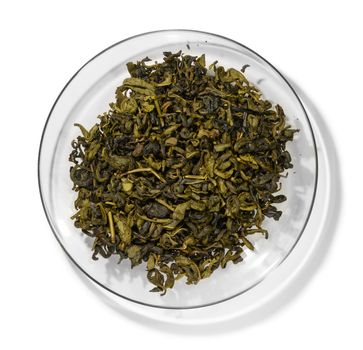 Green tea top view on white background.