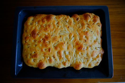 Focaccia is a flat oven-baked Italian bread product similar in style and texture to pizza dough