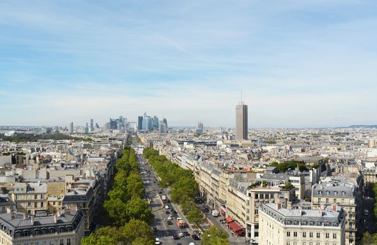View northwest from top of Arc de Triomphe along long avenue towards the Grande Arche in La Defense business district