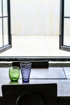 Water glass on wooden table