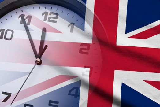 Dial of a clock counting down to twelve superimposed over the Union Jack national flag of the UK