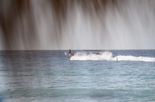 Motorboat whizzes to Bayahibe during day time