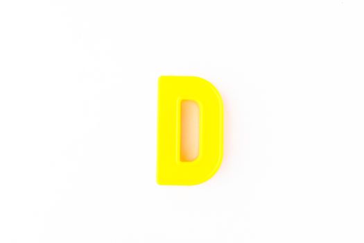 Colorful capital letter over white background