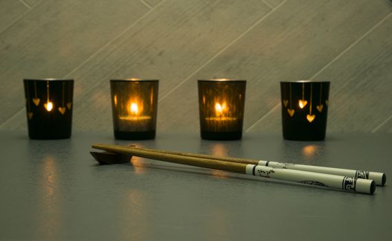 japanese or chines chopsticks with lights at the background
