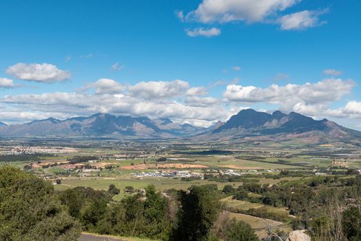 A farm landscape view from the Afrikaans Language Monument at Paarl in the Western Cape Province towards Simonsberg and the Hottentots-Holland Mountains