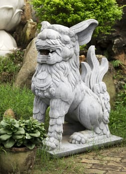 Marble lion at the entrance of a temple, Vietnam
