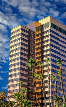Colorful Tropical Condo Tower against nice sky in Long Beach