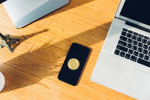 Coin bitcoin business digital finance electronic on smartphone and on desk table office.