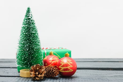 Christmas composition decorations, minimal green fir tree branches with snow on white background. Merry Christmas concept. Copy space for text