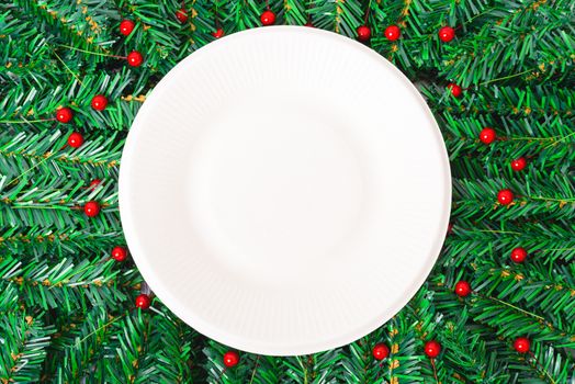 Happy New Year and Christmas day, top view flat lay composition decoration branches tree, white round on white background with copy space for your text