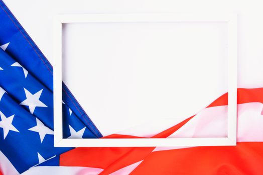 Martin luther king day, flat lay top view, American flag and photo frame on white background with copy space for your text