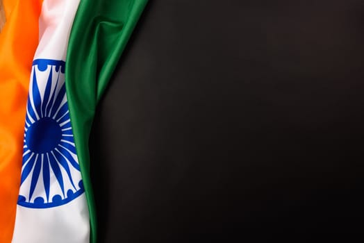 Indian republic day, flat lay top view, Indian flag on black background with copy space for your text