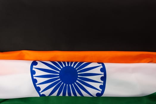 Indian republic day, flat lay top view, Indian flag on black background with copy space for your text