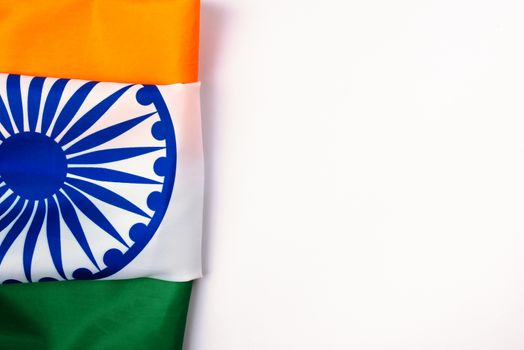 Indian republic day, flat lay top view, Indian tricolor flag on white background with copy space for your text