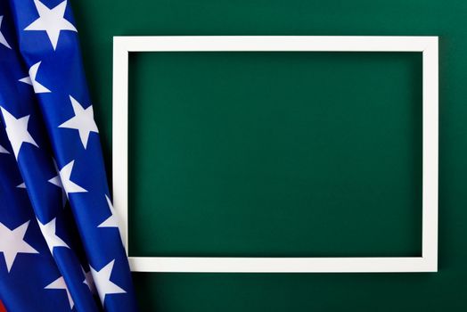 President's Day Concept, flat lay top view, America Flag and photo frame on Olive green background with copy space for your text