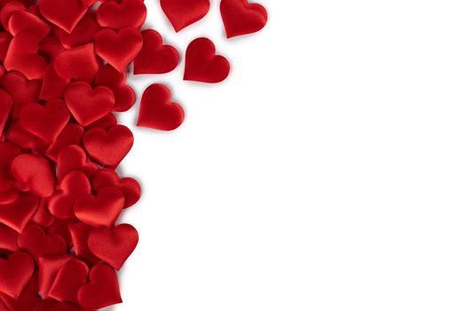 Valentine's day many red silk hearts background , border frame isolated on white with copy space, love concept