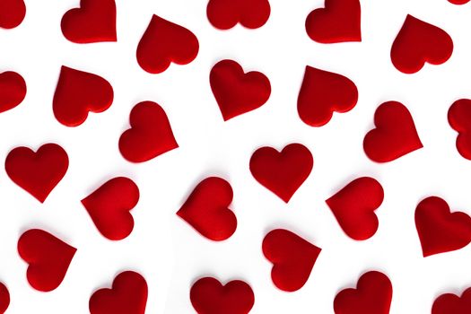 Valentine's day many red silk hearts isolated on white background, love concept