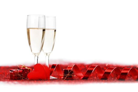 Two glasses of champagne with red decor, Valentines day concept