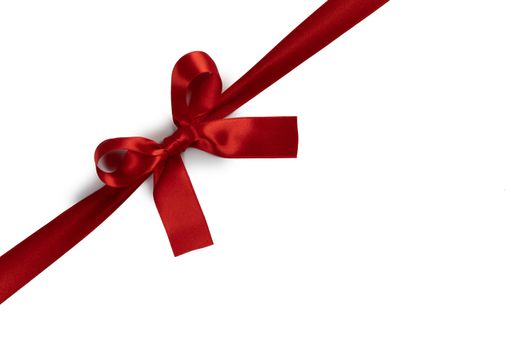 Elegant satin red ribbon bow isolated on white background