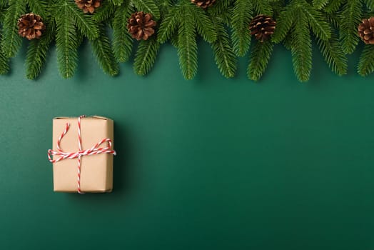 Happy new year, christmas day concept top view flat lay fir tree branches, gift box and decoration