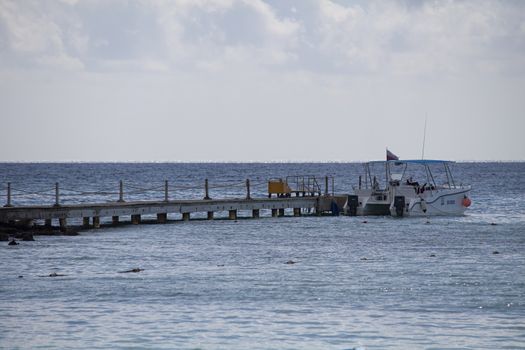 BAYAHIBE, DOMINICAN REPUBLIC 13 DECEMBER 2019: Pier for mooring Caribbean tourist boats