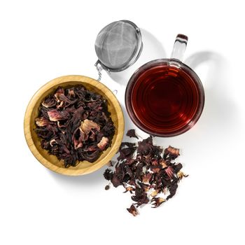 Hibiscus tea and beverage accessories on white background.