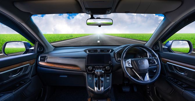 Looking through a car windshield with beautiful landscape. Travel in car.