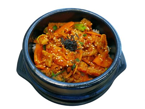 Korean food, stir fried pork with kimchi on rice.