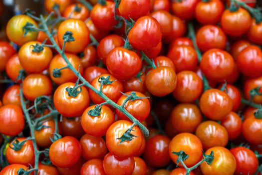 Red tomatoes healthy vegetables in carton box as food background. Supermarket retail.