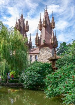 Ravadinovo, Bulgaria – 07.11.2019.  Small pond and oriental garden in the castle In love with the wind in the village of Ravadinovo, Bulgaria, on a sunny summer day