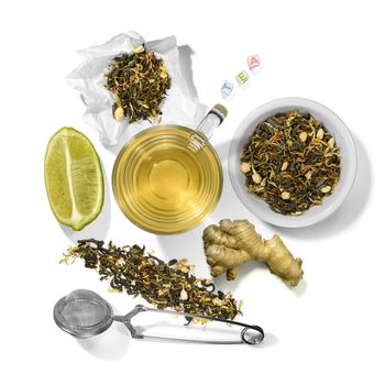 Green tea with aromatic additives and accessories. Top view on white background.