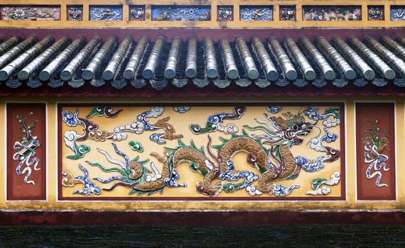 Dragon relief in Imperial Palace in Hue, Vietnam