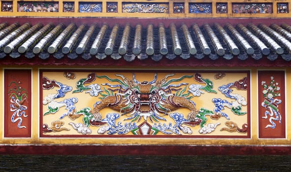 Dragon relief in Imperial Palace in Hue, Vietnam