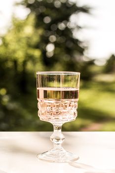 Rose wine in glass. Prosecco.