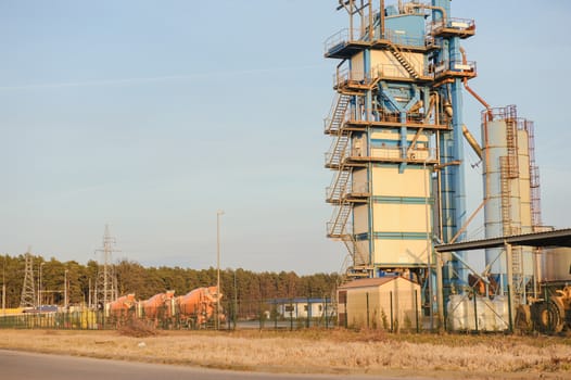 Modern industrial exterior building over blue sky