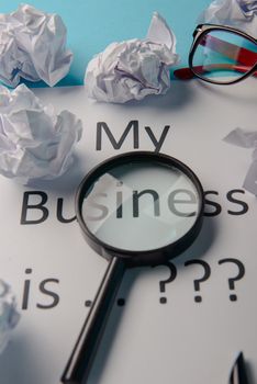 My business is word concept. Business word with business document paper on blue background. For business concept ideas background.
