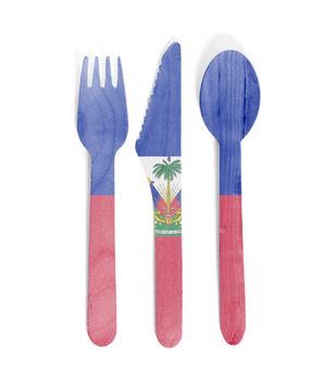 Eco friendly wooden cutlery - Plastic free concept - Isolated - Flag of Haiti