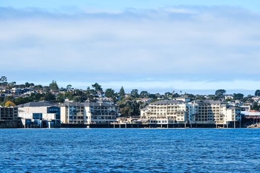 Condos on Monterey Coast Past Blue Sea