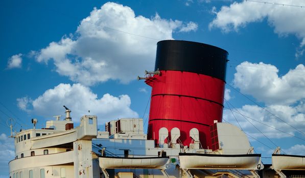 Red and Black Smokestack on Classic Old Cruise Ship