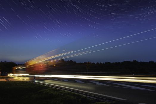 Speed Traffic - light trails on motorway highway at night, long exposure