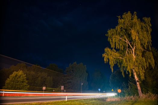 Speed Traffic - light trails on motorway highway at night, long exposure